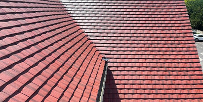 Newly installed red roof tiles on a residential property in Bromley.